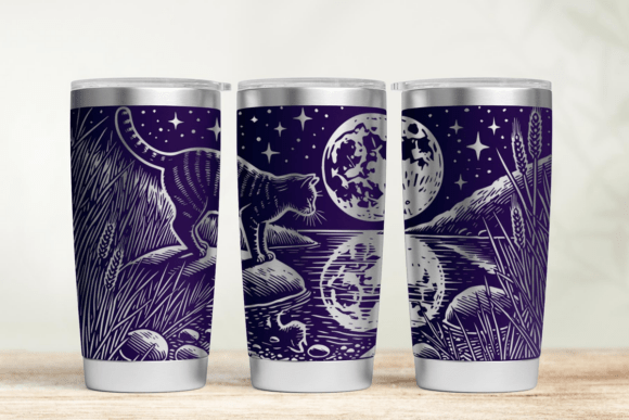 Three purple tumbler cups with celestial designs on a wooden surface.