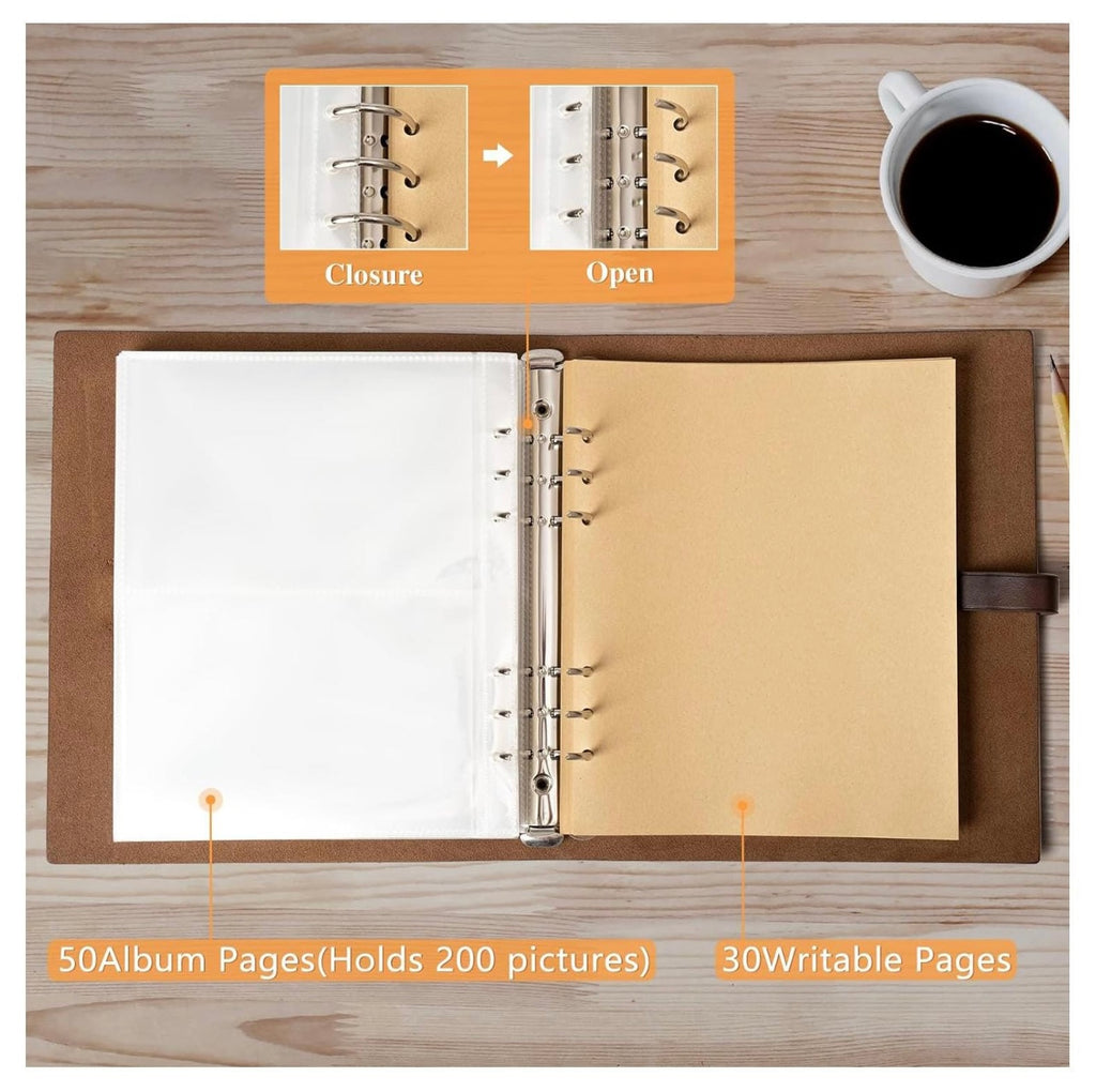 Open notebook with ring binding on a wooden surface next to a cup of coffee.