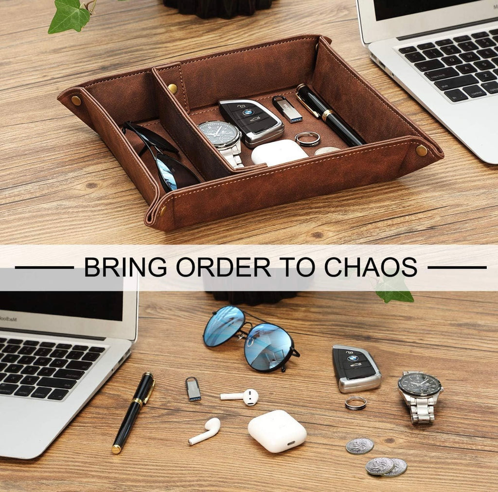 Brown leather tray with organized items on a desk, with text 'Bring Order to Chaos'.