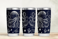 Three tumblers with octopus design on a wooden surface